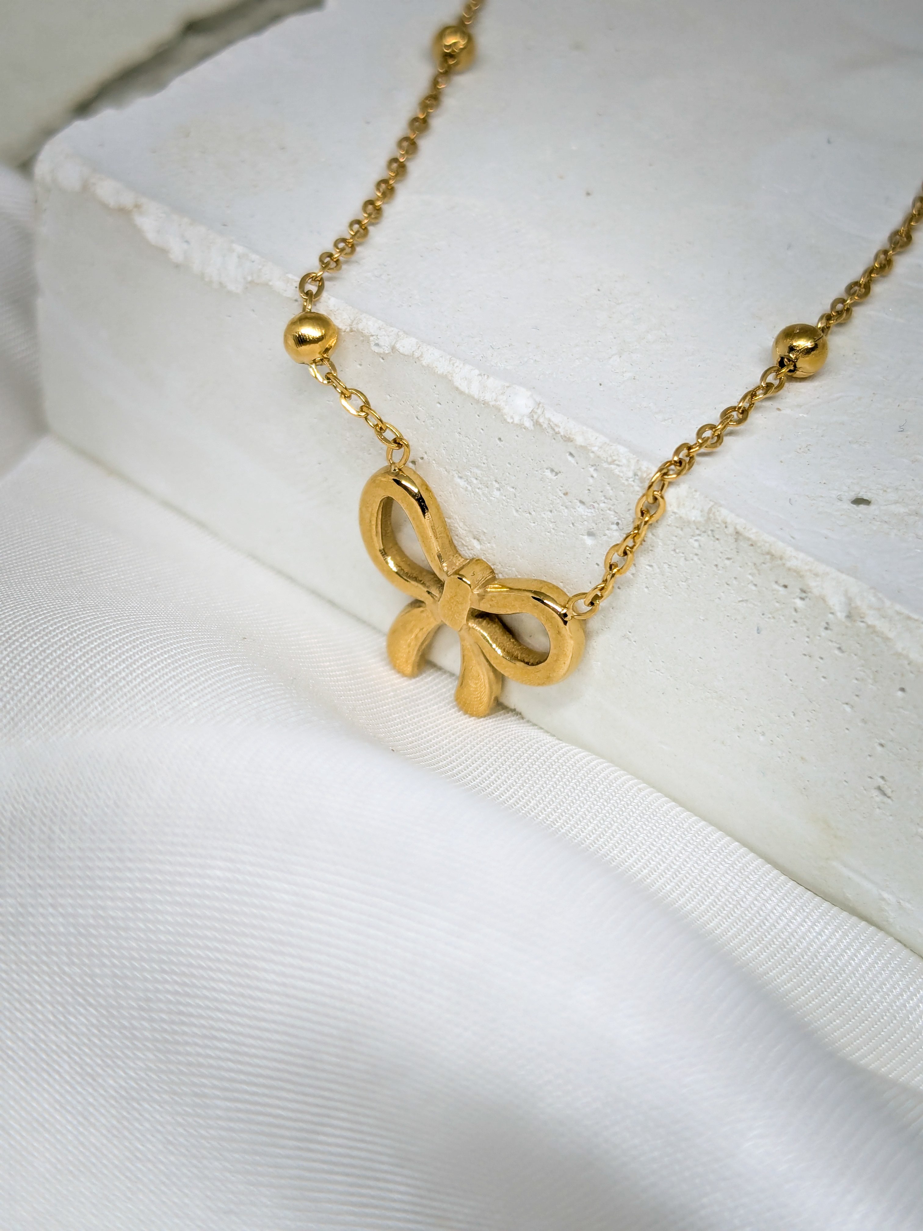 Golden Bow Charm Necklace