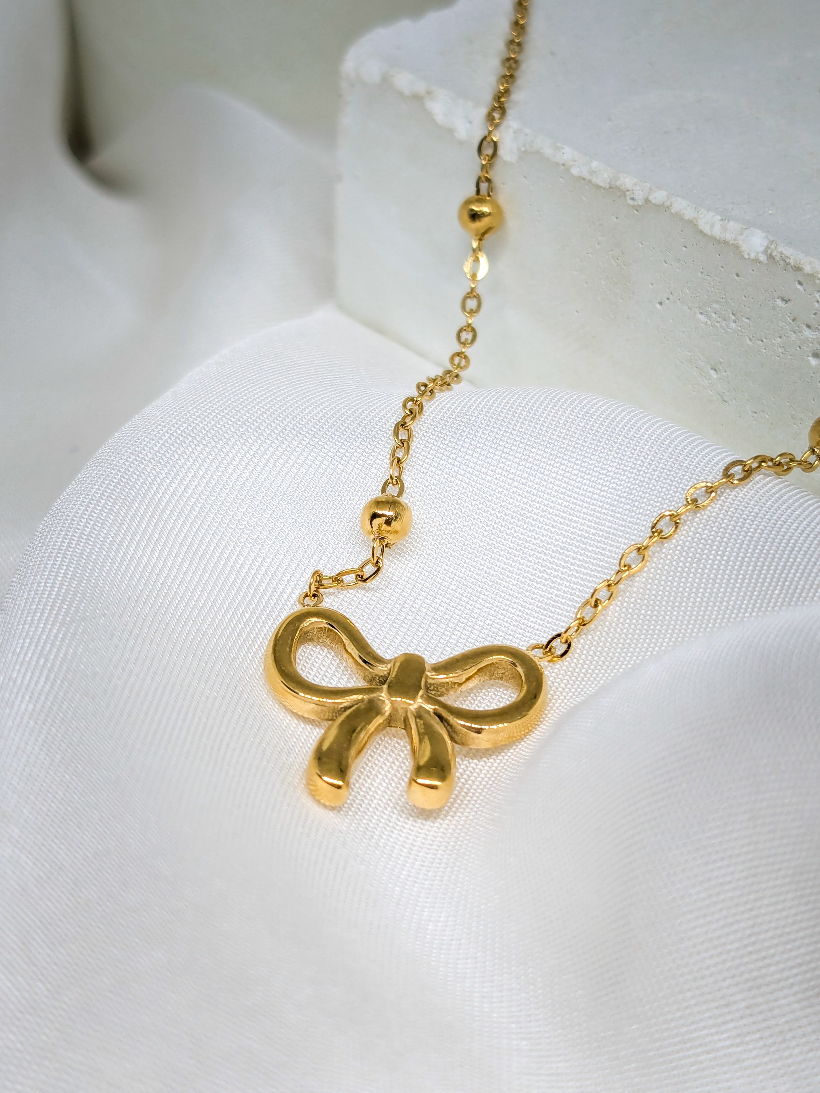 Golden Bow Charm Necklace