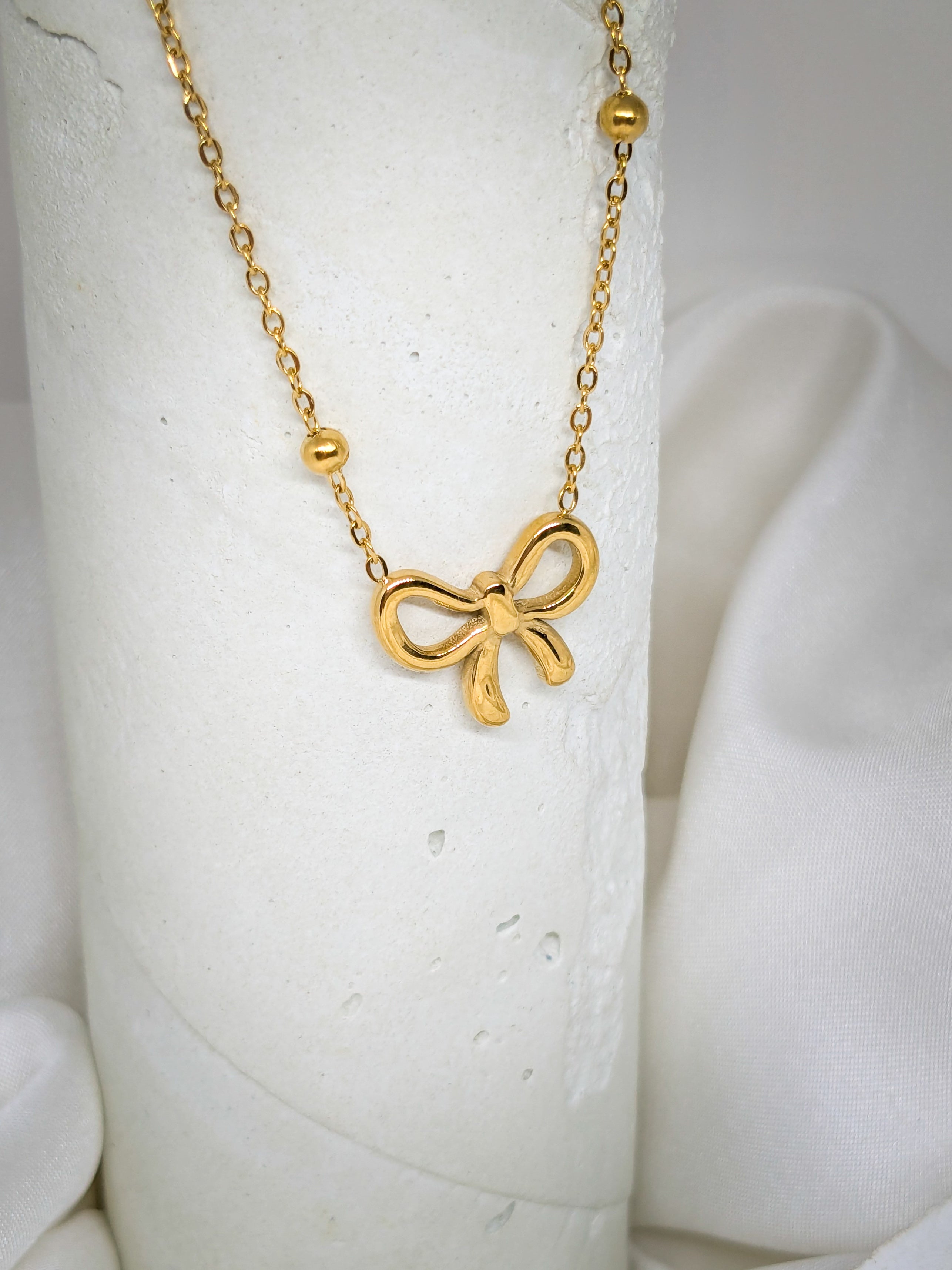 Golden Bow Charm Necklace