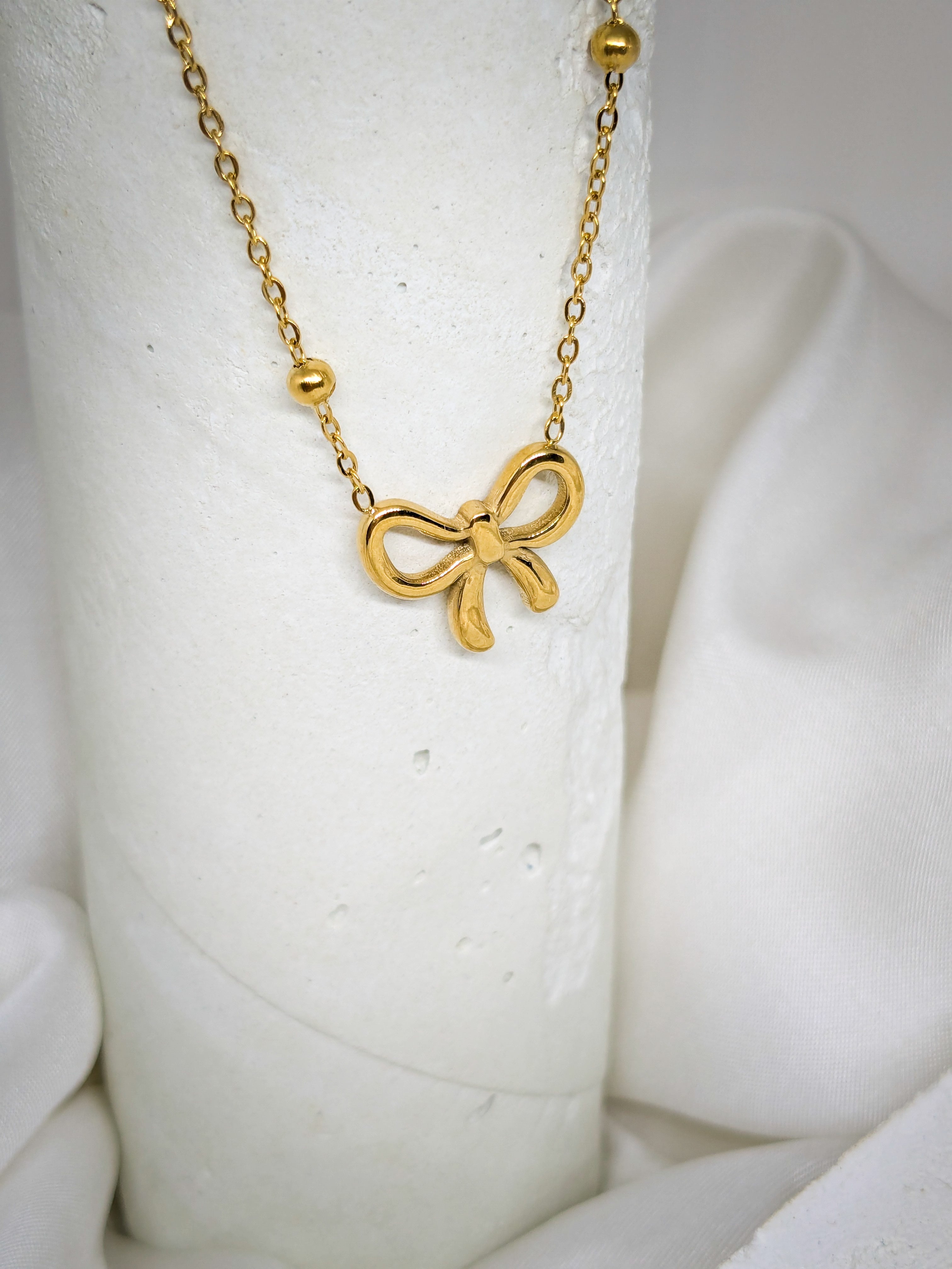 Golden Bow Charm Necklace